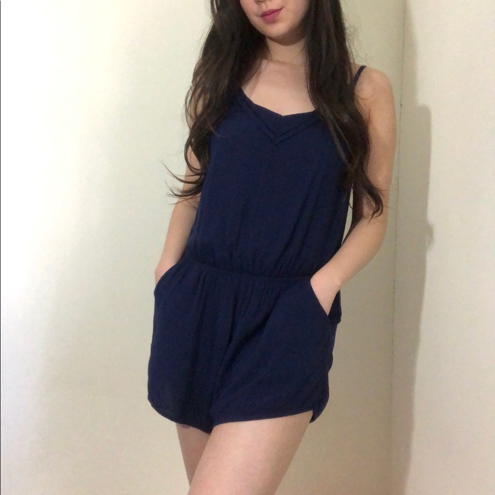 Express solid dark blue romper with pockets